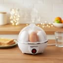 amazon basics Electric Egg Boiler | 350 Watt | Boils Upto 7 Eggs | Automatic Operation, 3 Boiling Modes | Overheat Protection | Stainless Steel Heating Plate, Measuring Cup | 75ml | Plastic | White 2