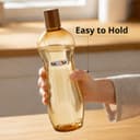 Nayasa Loopy 1000 ML Pet Plastic Fridge Water Bottles Set of 6 | BPA Free | Leak Proof | Airtight Lid | Brown 4