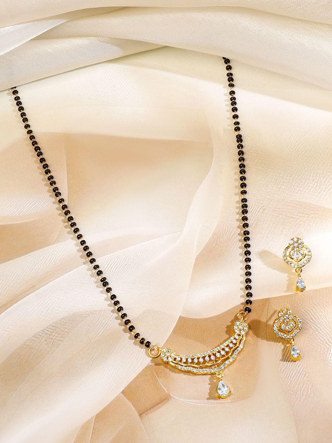 Rubans 18K Gold Plated Cubic Zirconia Studded Curved Bar With Black Beads Mangalsutra Set