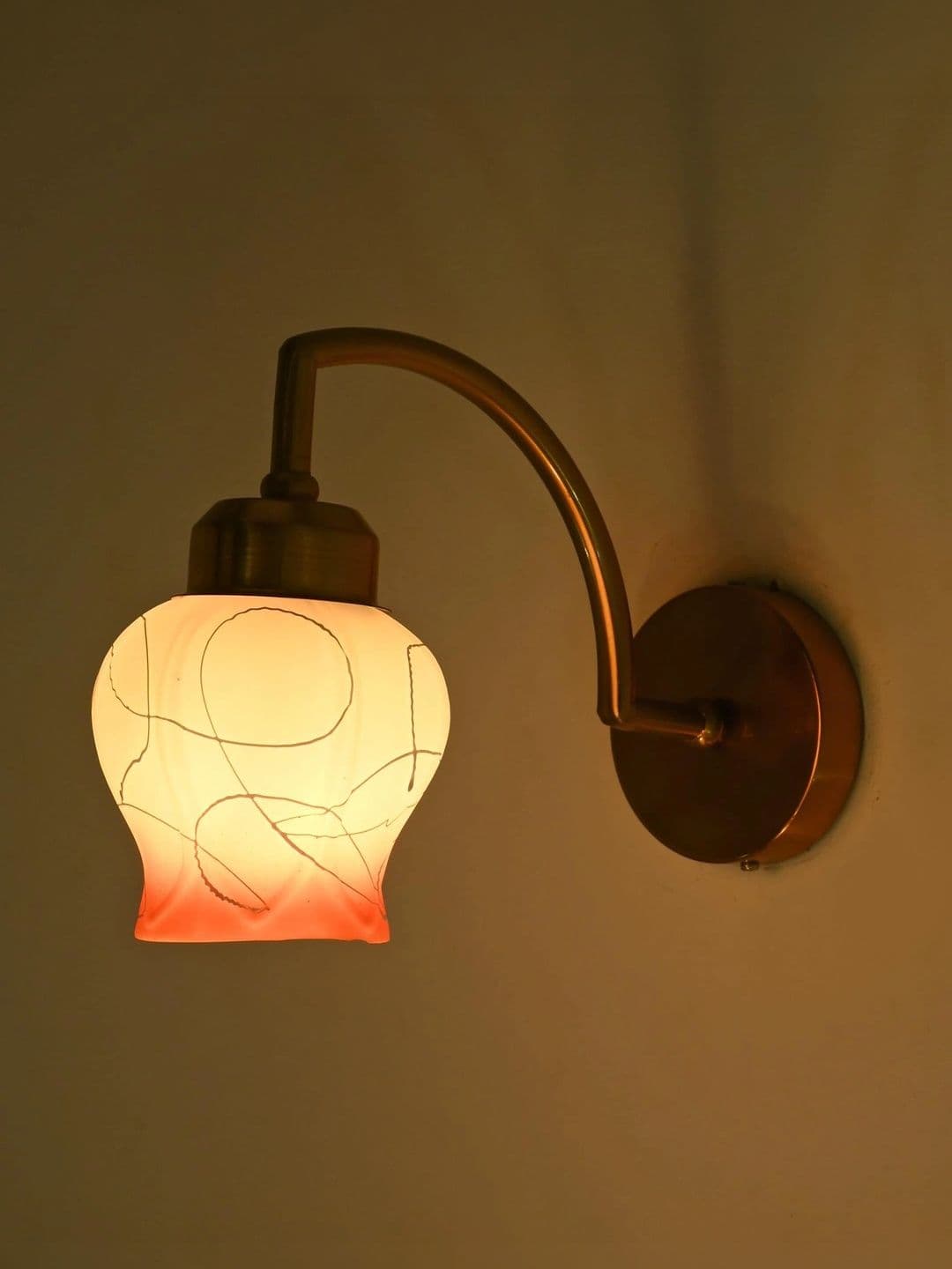 Myntra Elegant Homes Orange & White Textured Glass Traditional Wall Lamp